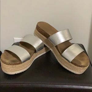 Platform metallic sandals. Light scuffing but good